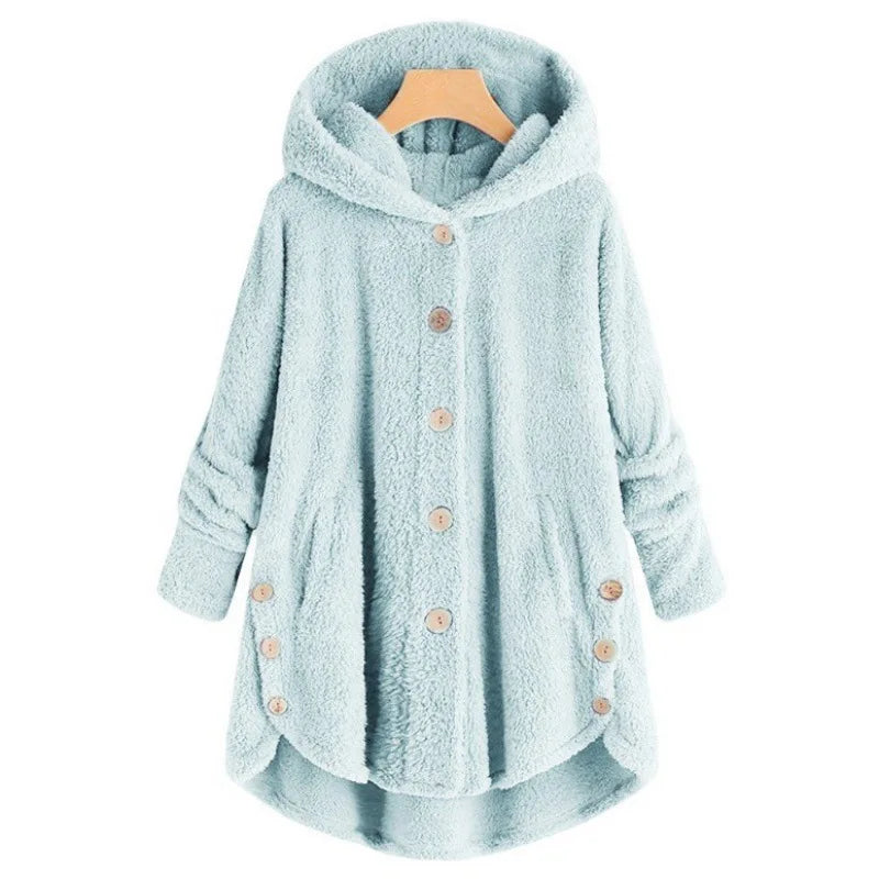 Light blue women's autumn and winter coat by Corporación Turística, warm and cozy, with a stylish design for cooler weather.
