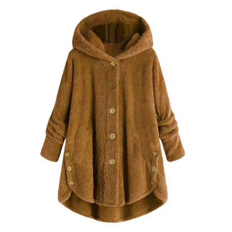 Blue sky-colored women's autumn and winter coat by Corporación Turística, warm and cozy, with a tailored fit and button details.