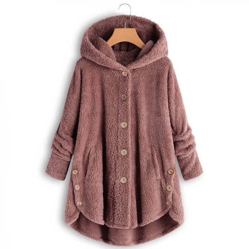 Light blue women's autumn and winter coat from Corporación Turística, warm, cozy, with a stylish winter jacket design.