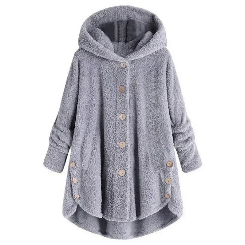 Light blue women's autumn and winter coat from Corporación Turística, featuring a warm, cozy design with a hood and front pockets.