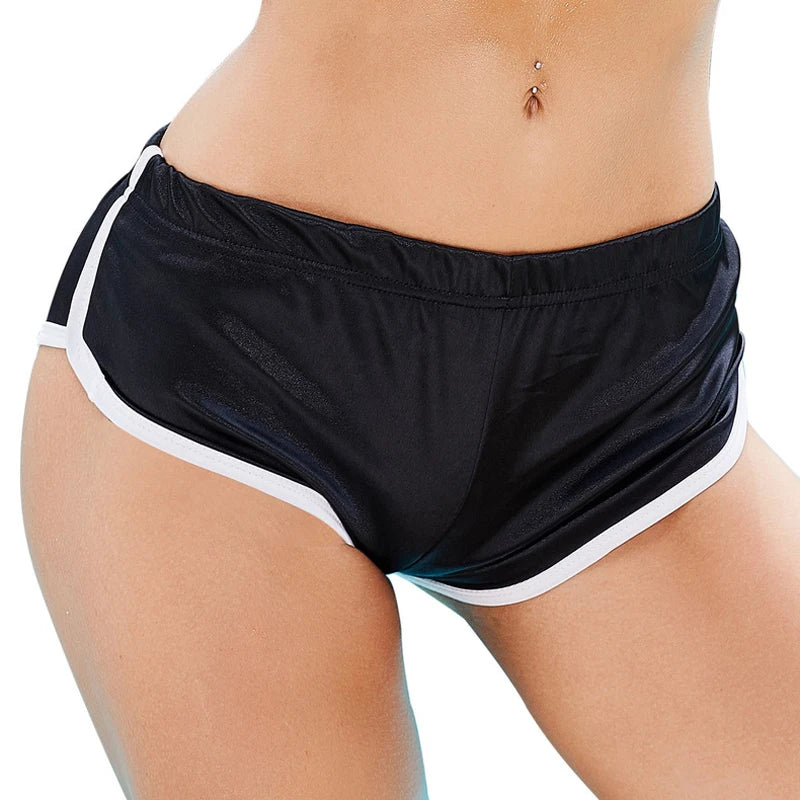 Bright blue satin low-waist beach pants from Corporación Turística, made of shiny, smooth fabric with a relaxed fit.