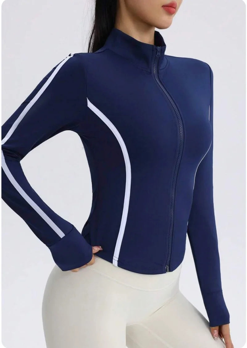 Marina blue women's yoga jacket with visible stitching from Corporación Turística, made of comfortable stretch fabric.