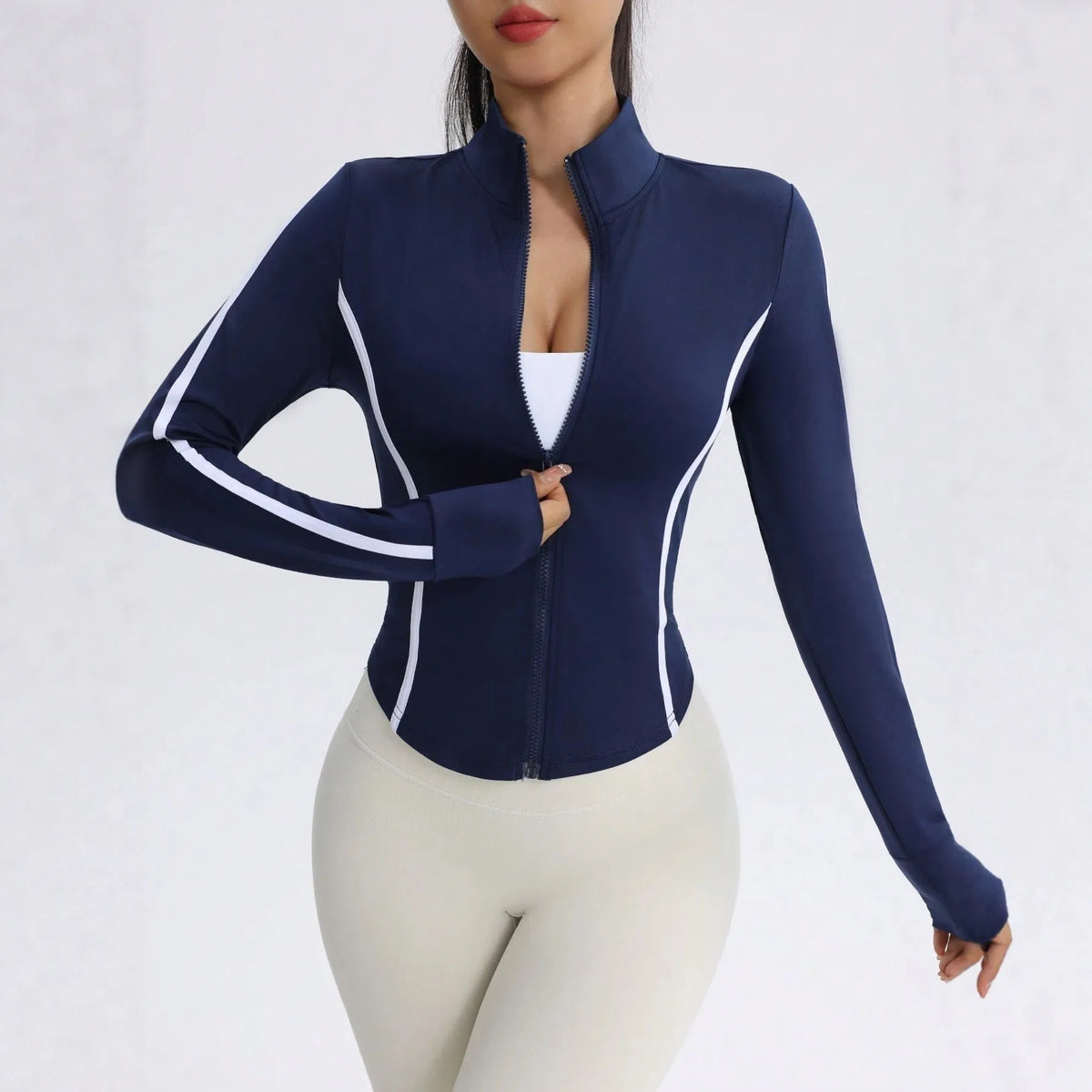 Blue women's high-neck sports jacket by Corporación Turística, ideal for fall and winter outdoor activities.