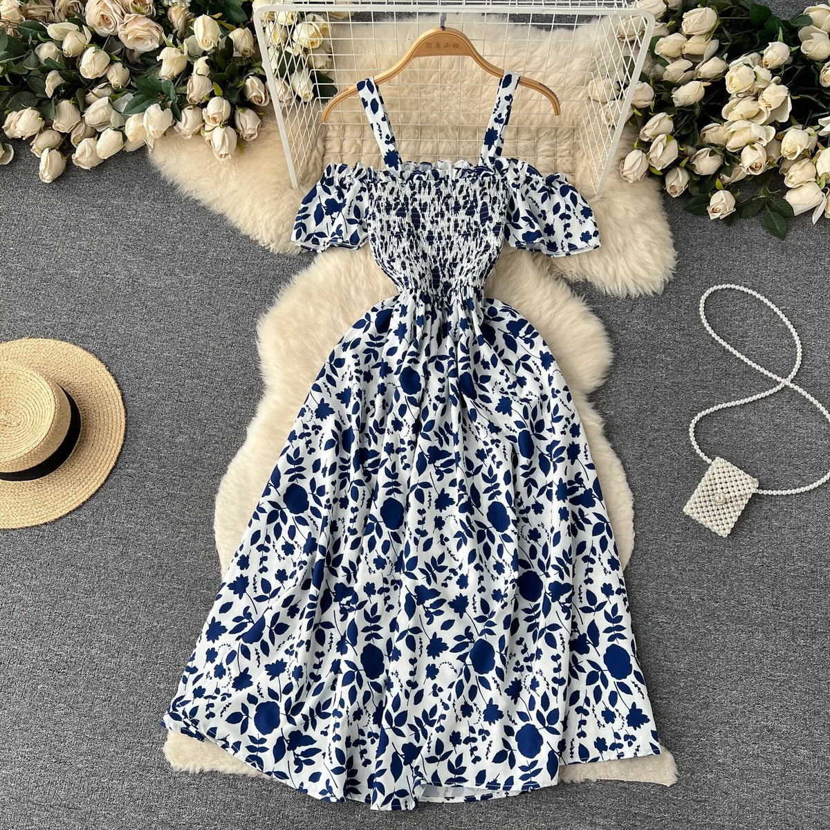 Blue floral long romantic dress by YuooMuoo, featuring a flowing design and elegant pattern, perfect for special occasions.