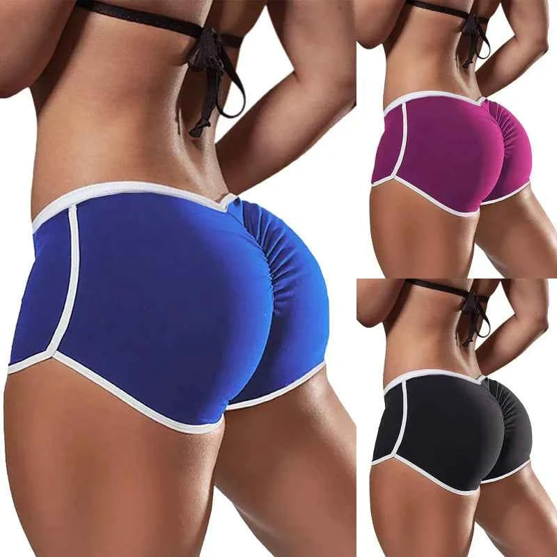Blue low-waist women's sports shorts by Corporación Turística, made of lightweight, breathable fabric for active wear.