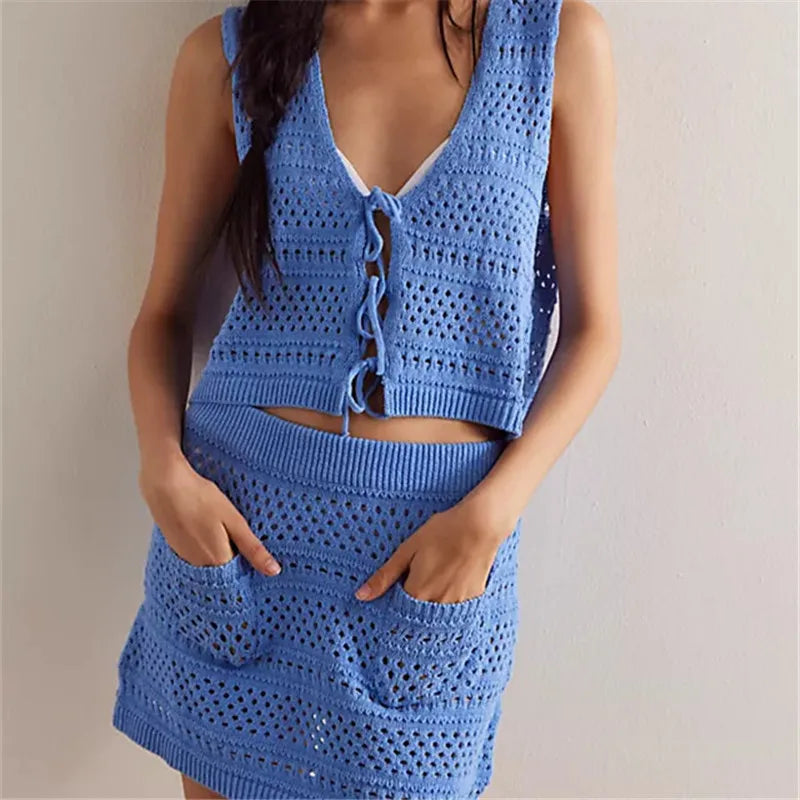 Two-piece crochet knit sets for women by Corporación Turística, featuring a stylish top and matching bottom.