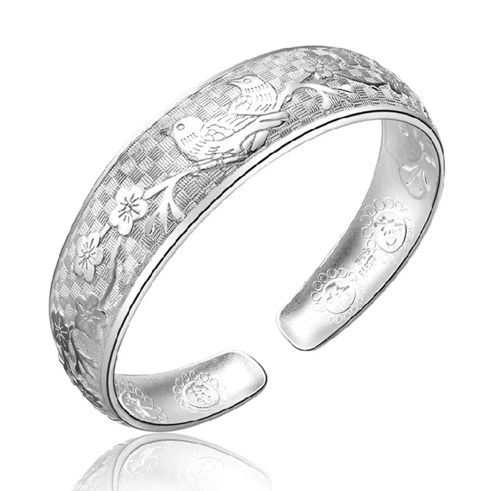 Open silver bangle bracelet for women, made of 925 sterling silver, featuring a simple and elegant design.
