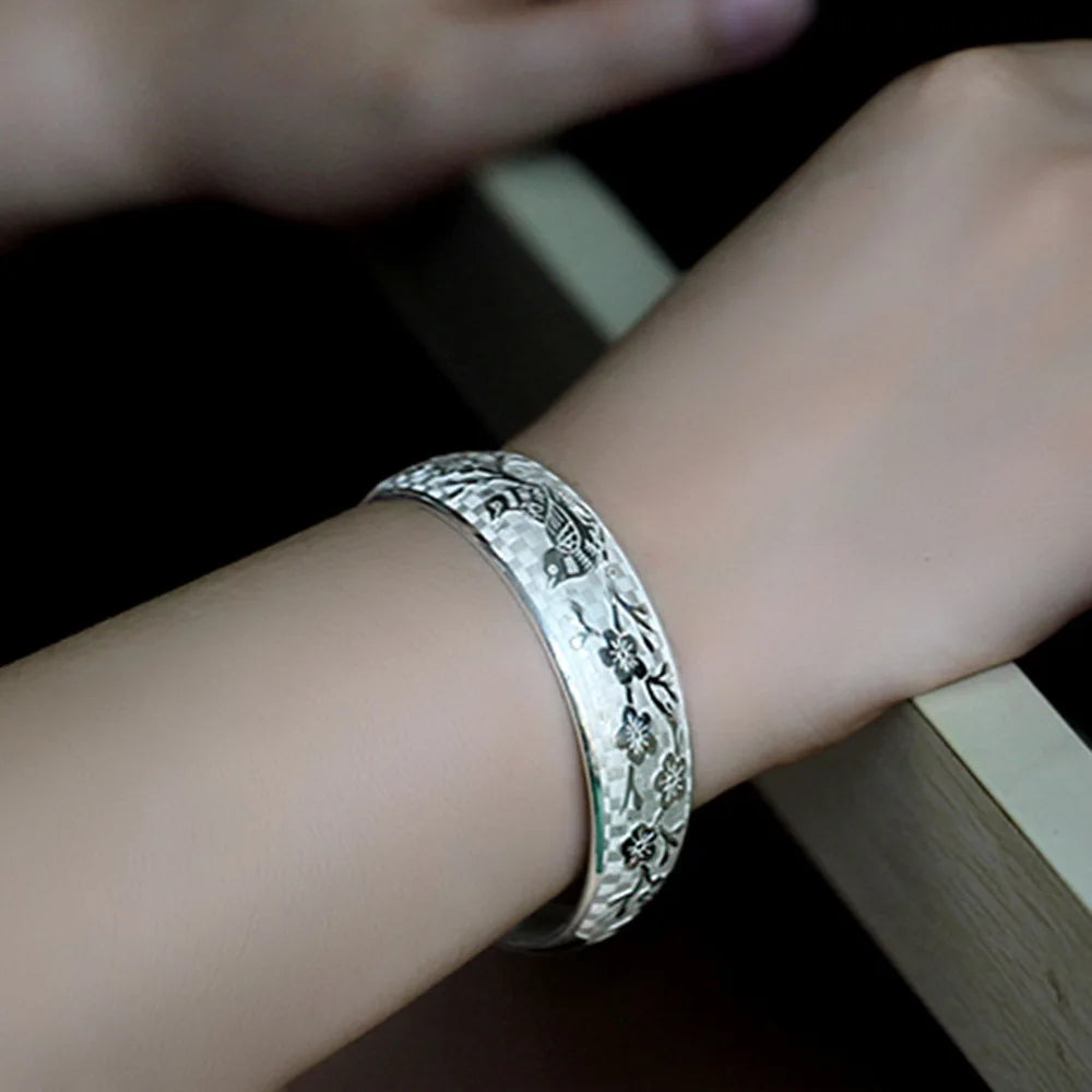 Simple sterling silver open bracelet for women, featuring sleek design and shiny finish, by Corporación Turística.
