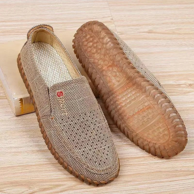Beige breathable mesh sneakers for men by Corporación Turística, athletic shoes with lightweight design and comfortable fit.