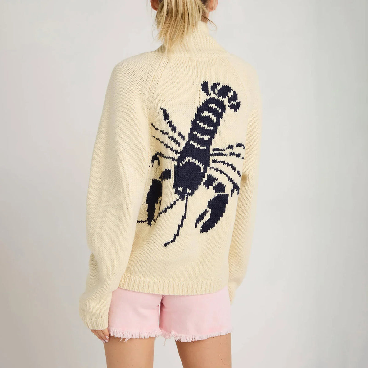 Beige women's knitted cardigan by Corporación Turística, cozy sweater and autumn jacket, oversized fit, soft and warm.