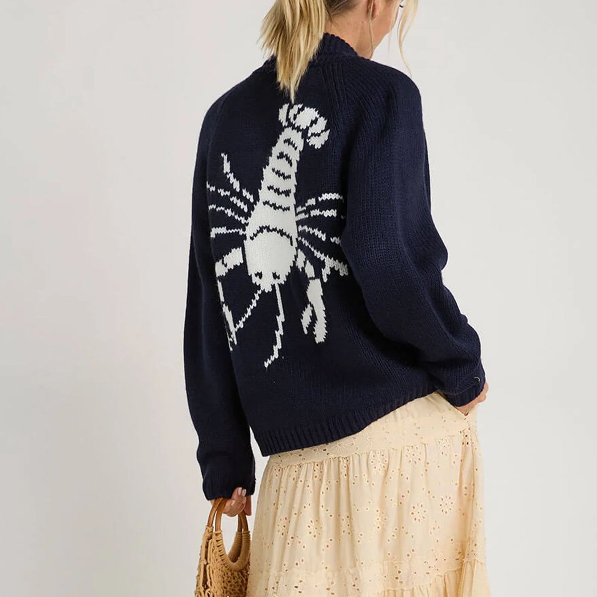 Beige women's knit cardigan by Corporación Turística, cozy sweater and fall coat for autumn and winter wear.