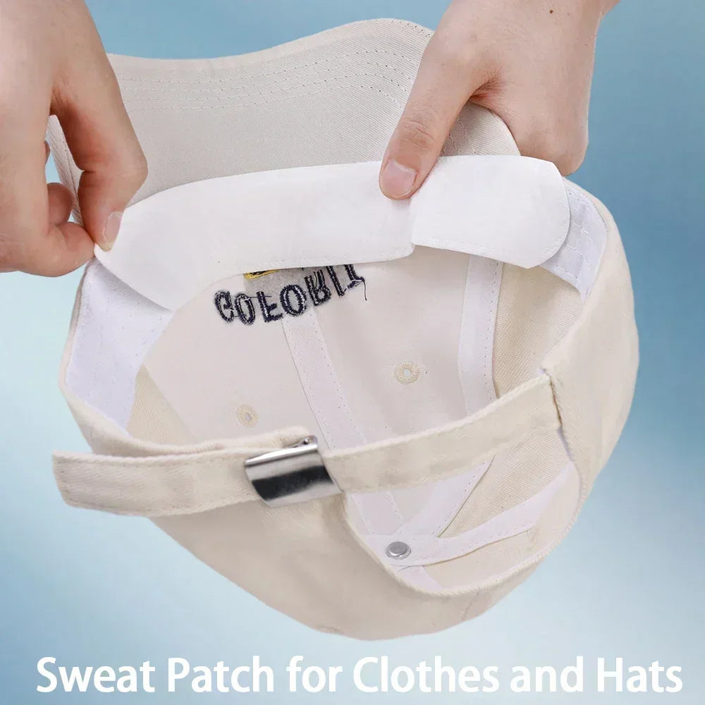 Set of 10/40 absorbent sweat stickers for hats by Corporación Turística, shown attached inside a black hat for sweat absorption.