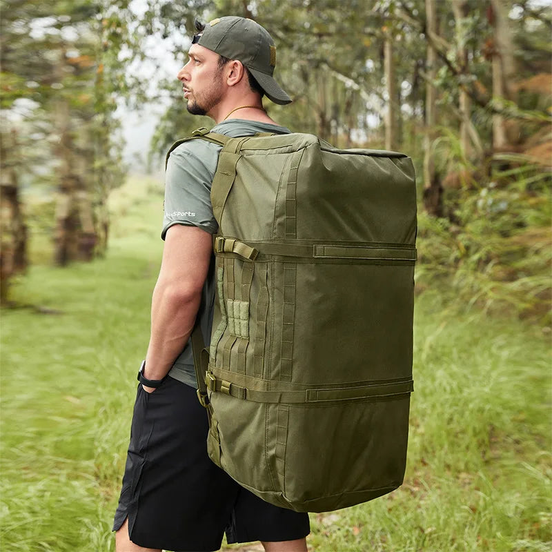 Black 106L travel bag and 40L camping backpack by Corporación Turística, durable and spacious for outdoor adventures.