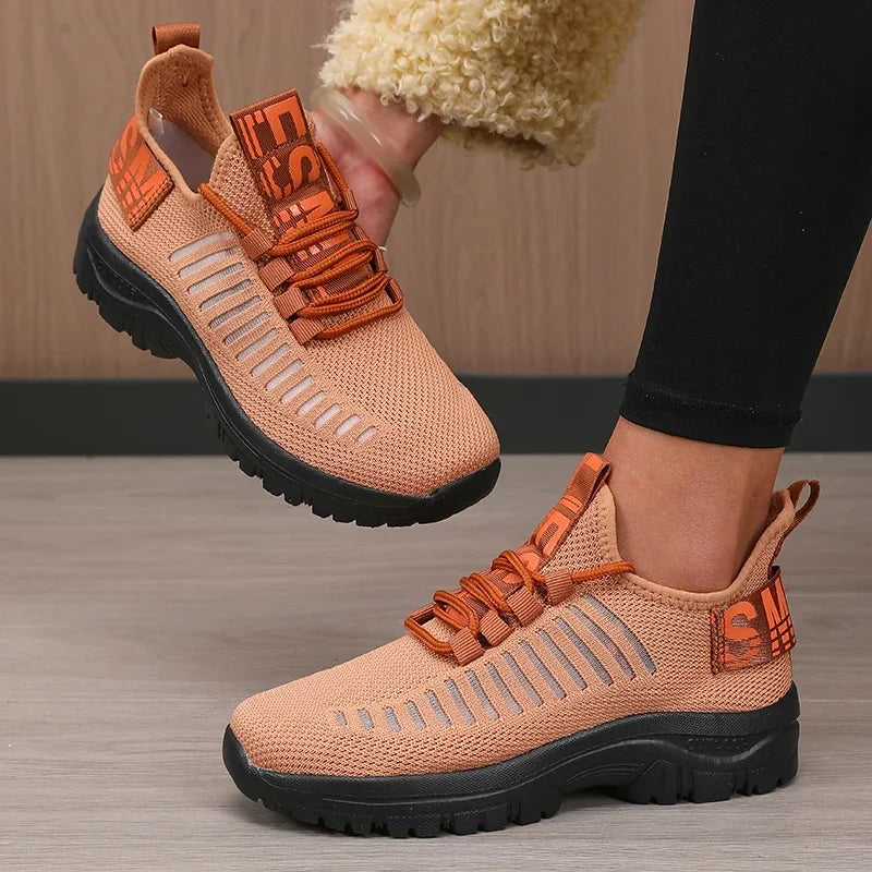 Black men's running sneakers by Corporación Turística with breathable mesh design and modern athletic style.