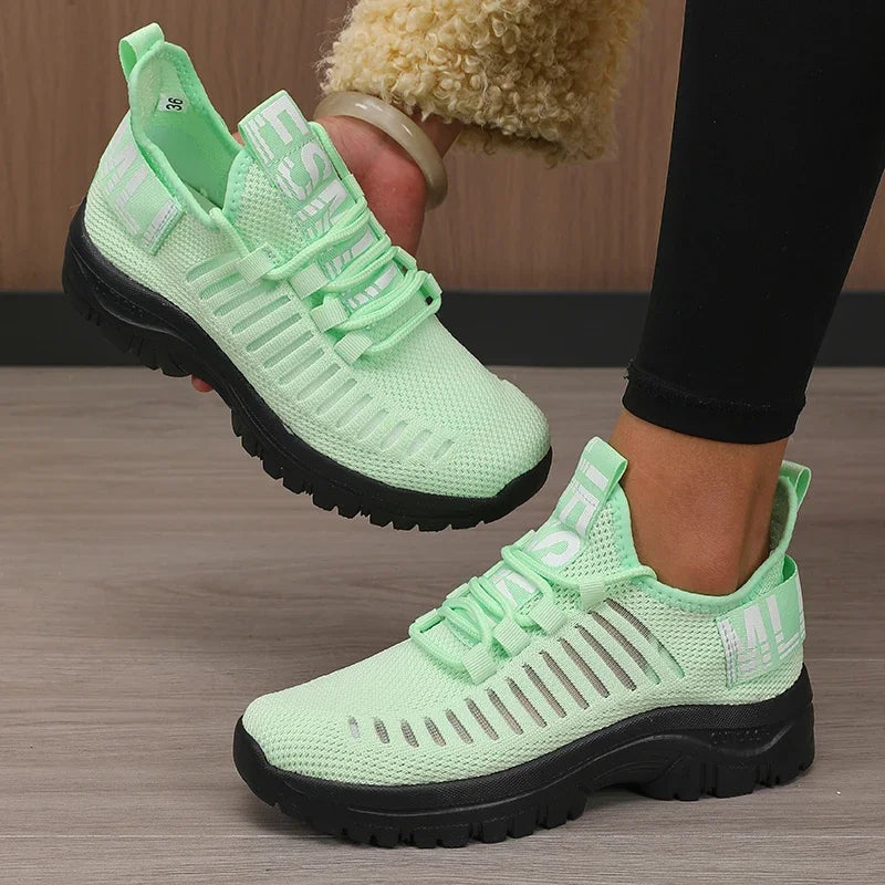 Black men's 2025 fashion mesh running shoes by Corporación Turística with sleek design and breathable material.