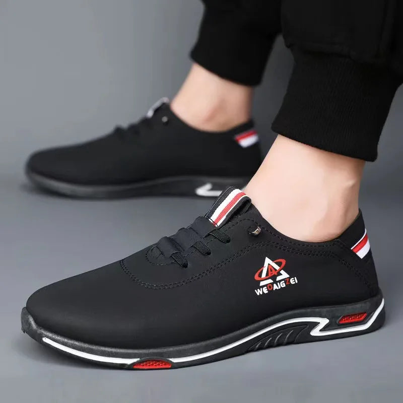 Black men's leather casual shoes with soft soles, featuring a sleek design from Corporación Turística.