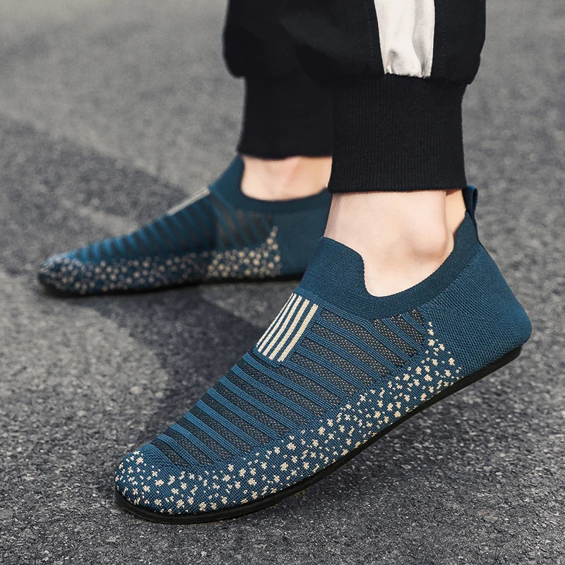 Black YRZL men's driving moccasins from Corporación Turística, featuring a sleek slip-on design and comfortable leather sole.