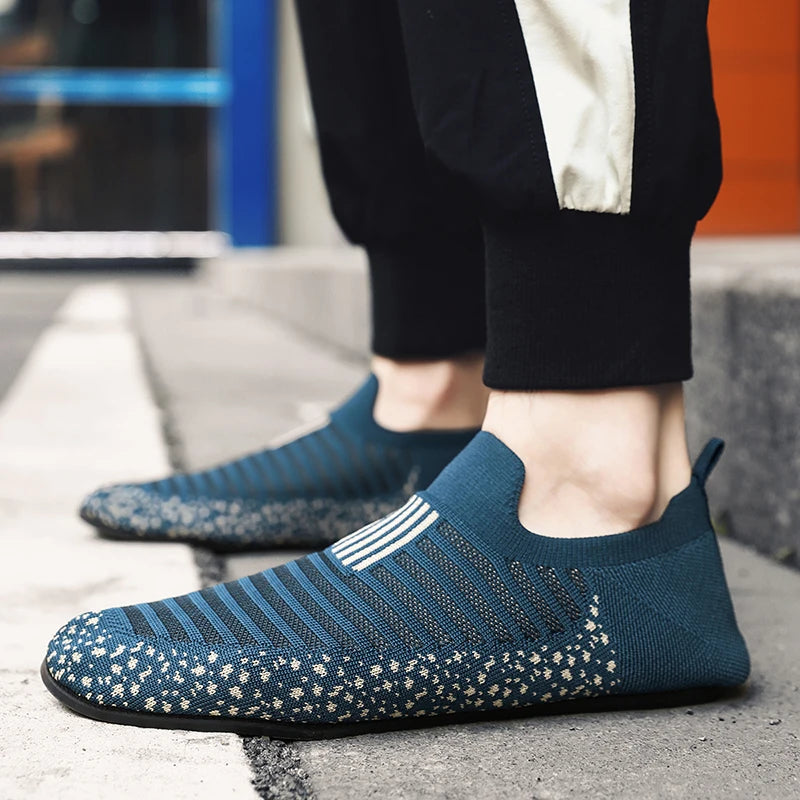 Black YRZL men's driving loafers by Corporación Turística, showcasing slip-on moccasin style with a sleek design and comfortable fit.
