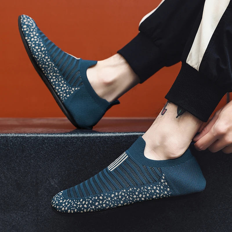Black YRZL men's driving loafers by Corporación Turística, showing the stylish slip-on moccasins with sleek design and comfortable fit.
