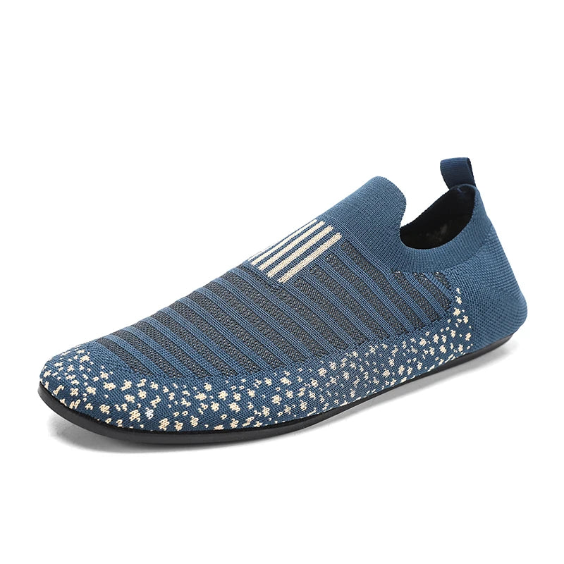 Black YRZL men's driving moccasins with slip-on design, featuring smooth leather uppers and durable rubber soles.