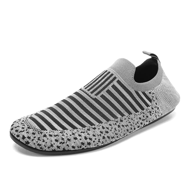 Black YRZL men's driving loafers by Corporación Turística, showcasing the slip-on moccasin style with a sleek design.