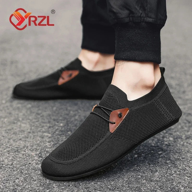 Black YRZL mesh loafers for men by Corporación Turística, featuring comfortable slip-on design suitable for driving and casual wear.