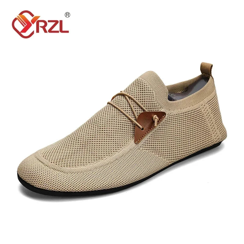 Black YRZL mesh loafers for men by Corporación Turística, stylish slip-on moccasins designed for comfortable driving.