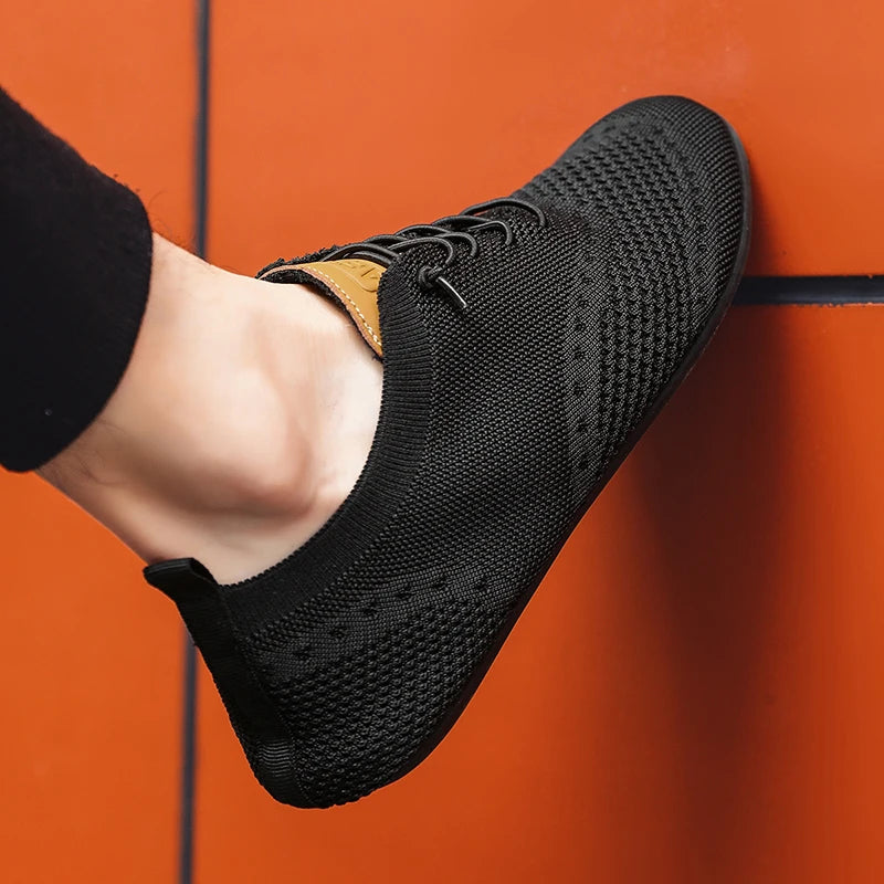 Black MAEDEF men's casual driving shoes by Corporación Turística, stylish and comfortable footwear for everyday wear.