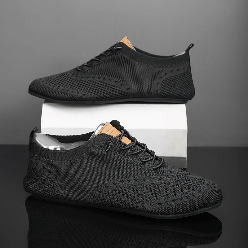 Black MAEDEF men's driving shoes by Corporación Turística, casual slip-on footwear with sleek design and comfortable fit.