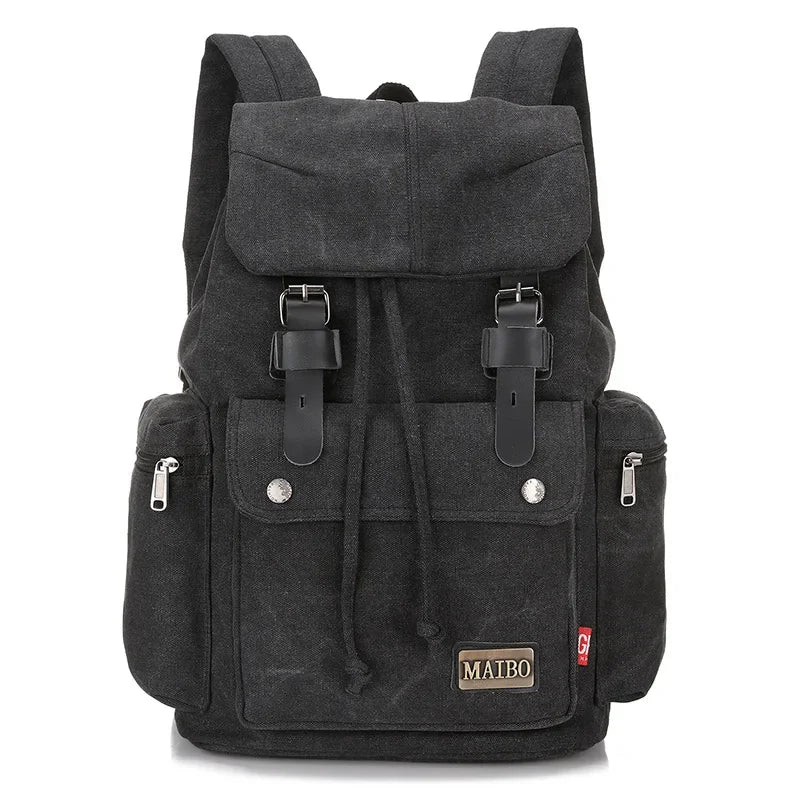 Black Corporación Turística travel and hiking backpack with multiple compartments, suitable for camping, climbing, and outdoor adventures.