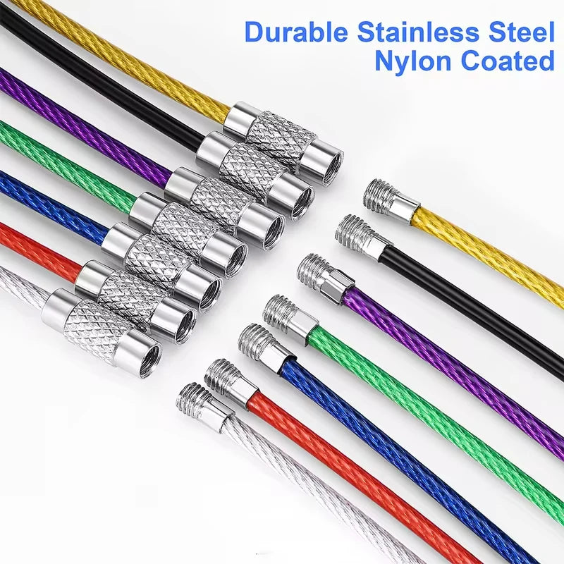 Set of five black stainless steel wire keychains with PVC coating from Corporación Turística, durable and lightweight key accessories.