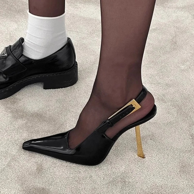 Black patent high-heeled sandals for women with 7cm heel, featuring sleek straps and a stylish design.