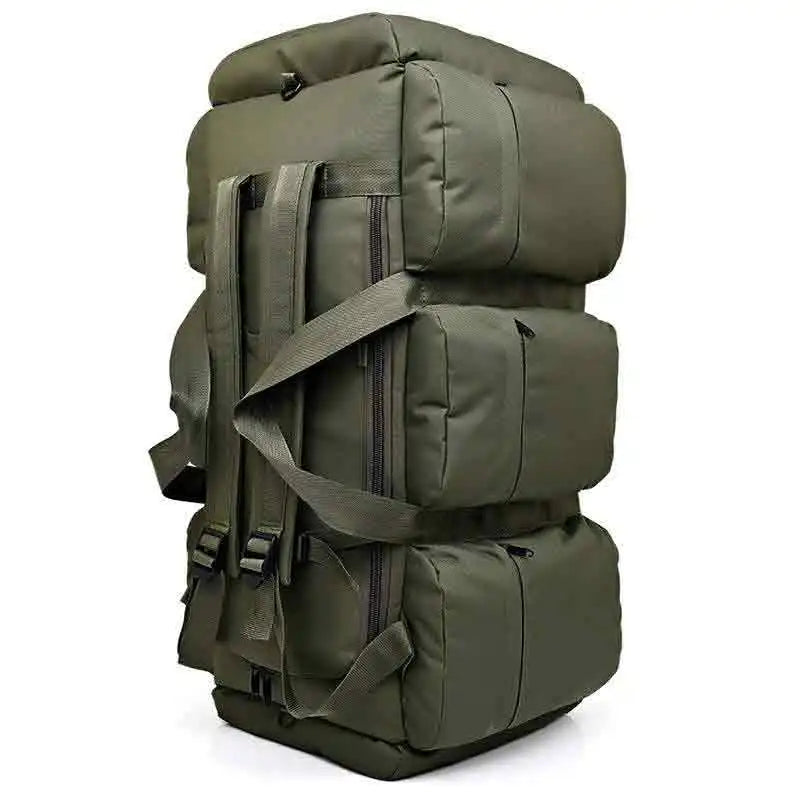 Black 100L camping backpack by Corporación Turística, large travel luggage bag with multiple compartments and sturdy straps.