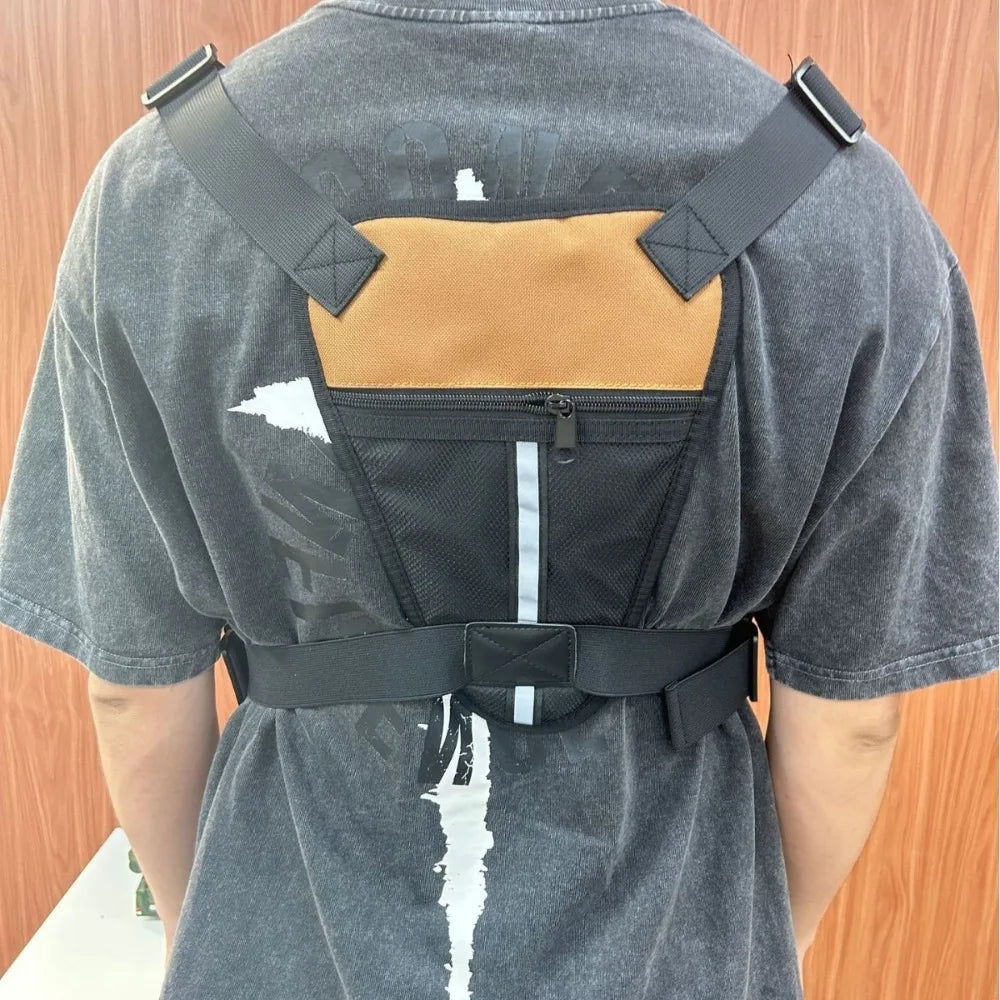 Black men's outdoor activity chest bag by Corporación Turística, featuring multiple compartments and adjustable strap.