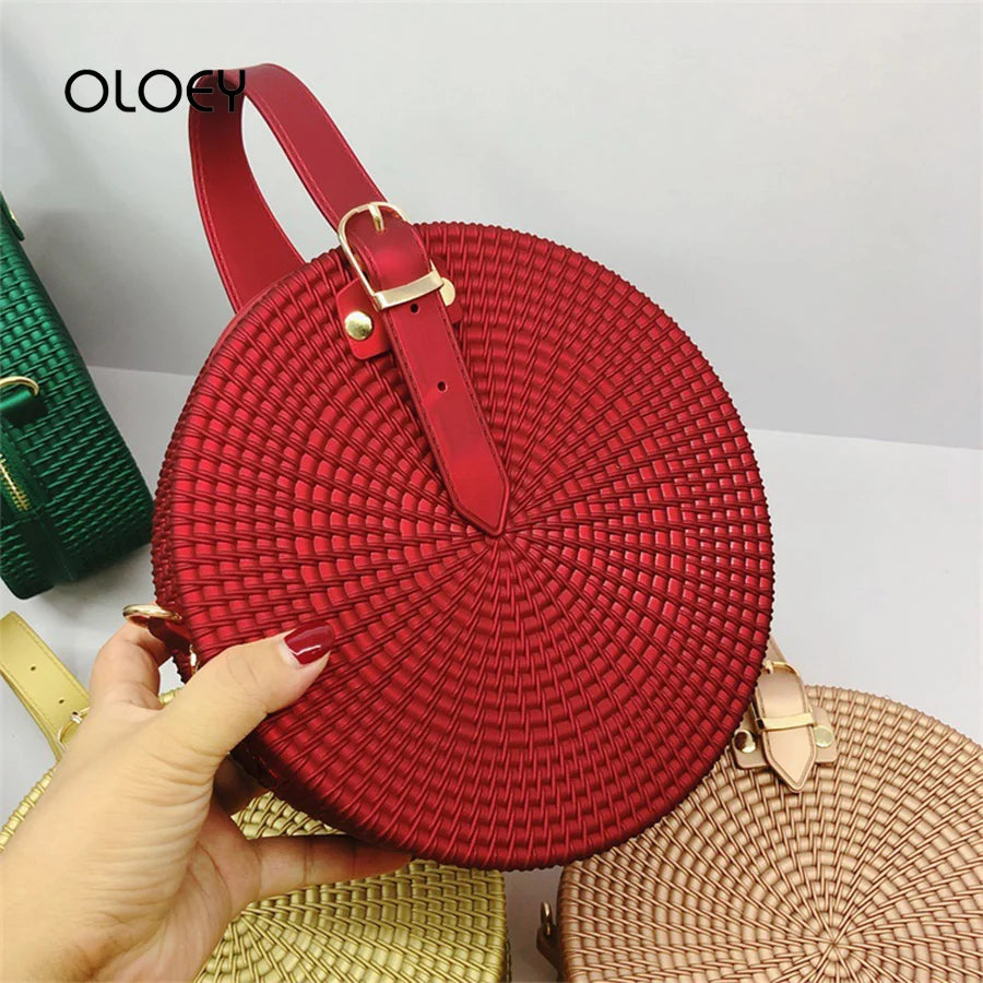Red esmerilado women's round shoulder bag by Corporación Turística, stylish and compact with a sleek design.