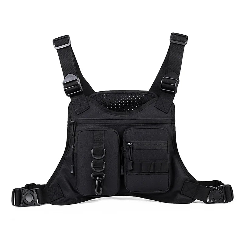 Black camouflage tactical vest with front MOLLE system and chest pocket, designed for military or outdoor use by Corporación Turística.