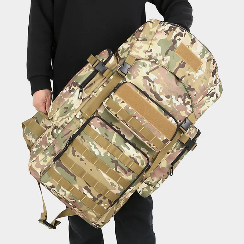 Black tactical backpack for climbing, camping, hiking, and cycling by Corporación Turística, with multiple compartments and adjustable straps.