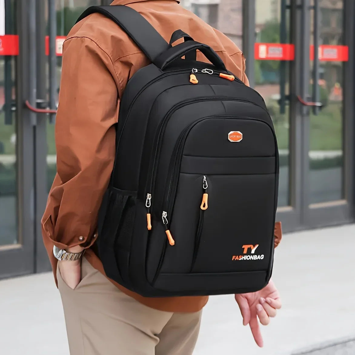Black men's backpack by Corporación Turística, casual waterproof backpack with one main compartment and adjustable straps.