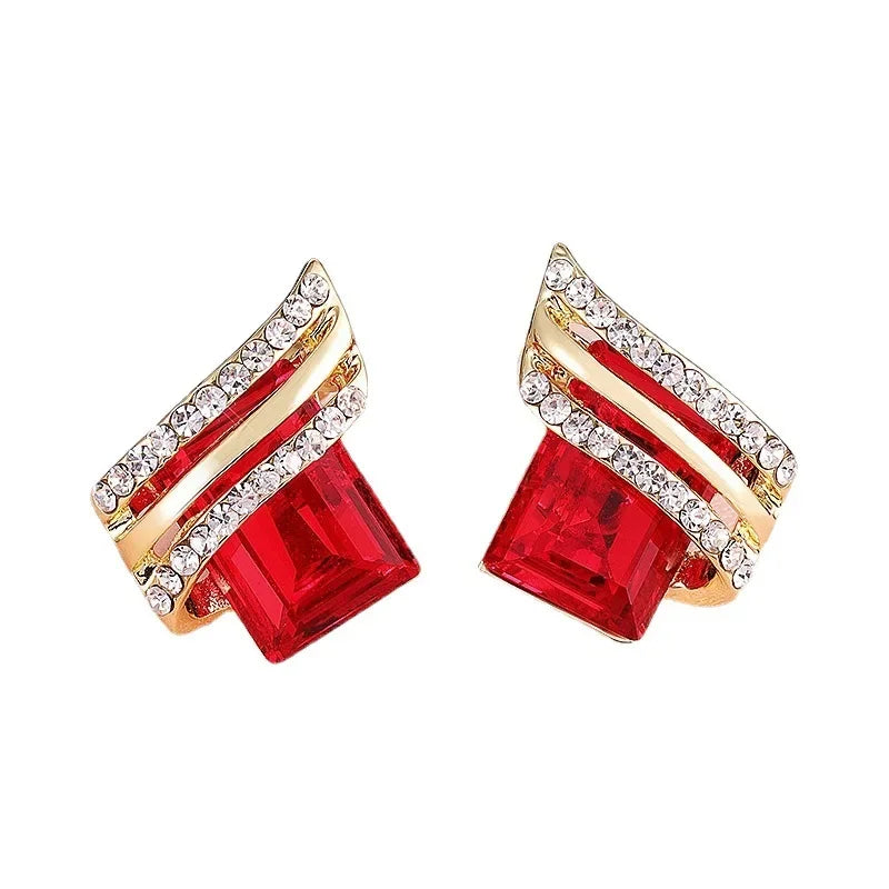 Black crystal zircon diamond-shaped angel wing earrings for women, elegant jewelry by Corporación Turística.