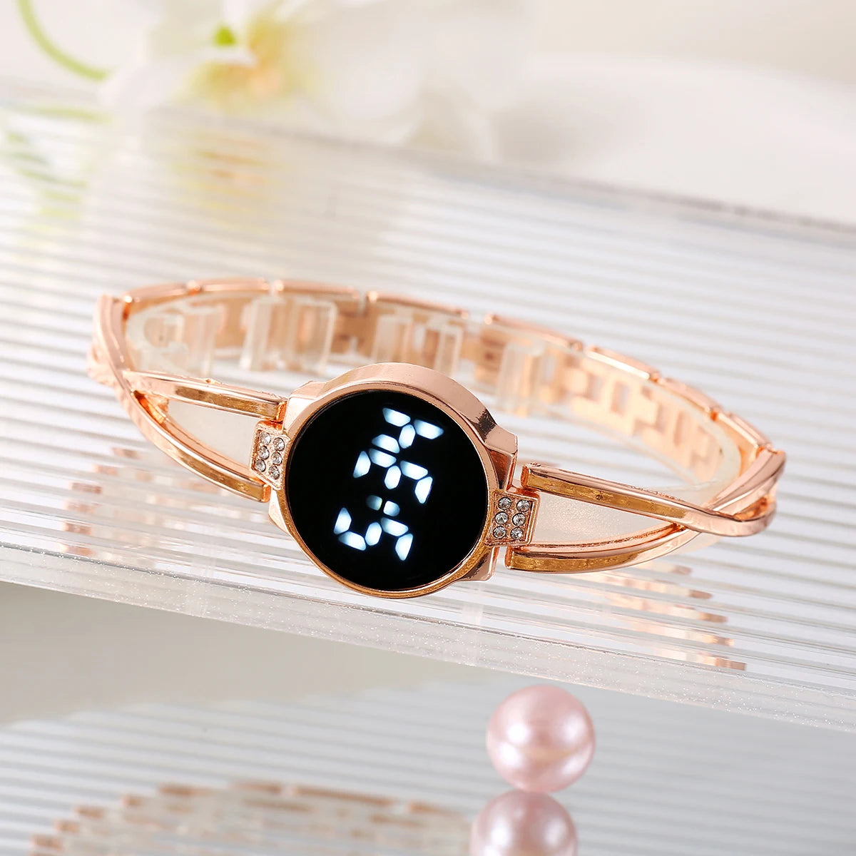 Black LED fashion watch by Corporación Turística featuring a Korean-style touch screen and feminine design.