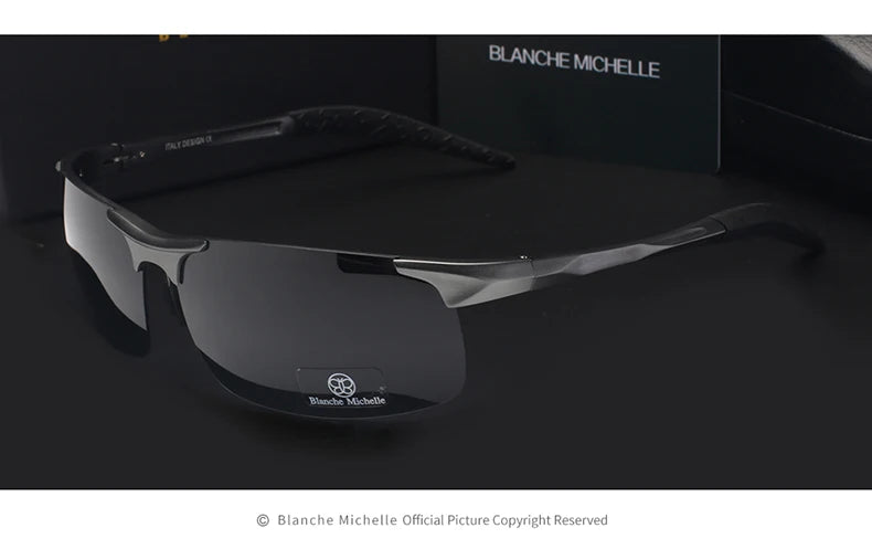 Black and silver rectangular UV400 outdoor driving sunglasses by Corporación Turística, designed for outdoor sun protection.