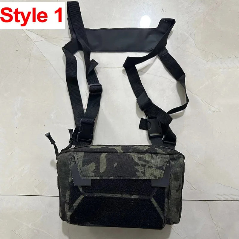 Black tactical chest pouch and backpack from Corporación Turística, designed for attaching to a tactical vest or chest.