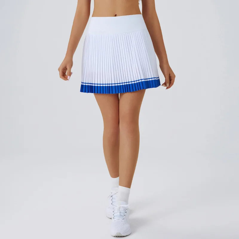 Black sexy yoga shorts with a pleated skirt design from Corporación Turística, suitable for fitness and active wear.