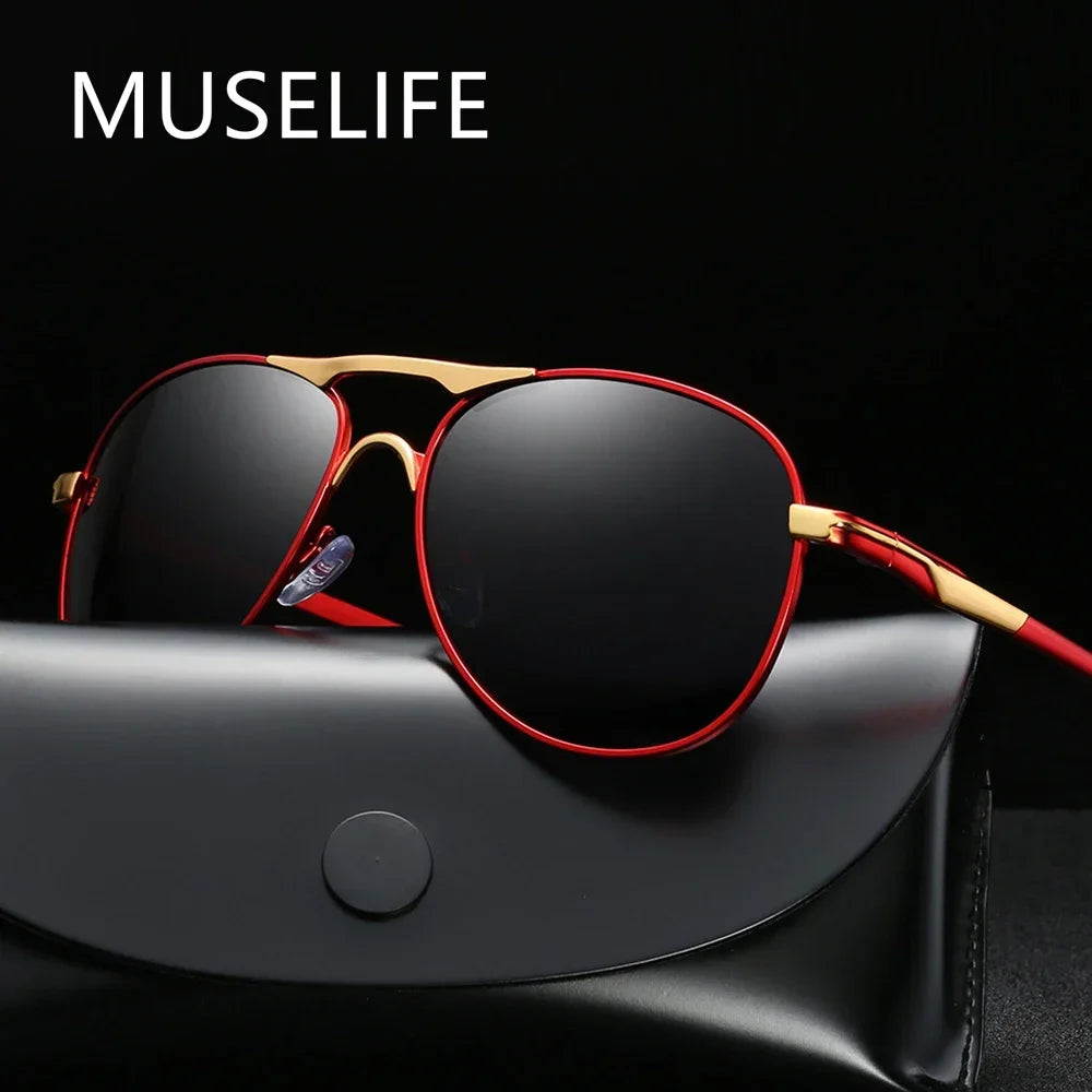 Luxury polarized sunglasses for men and women by Corporación Turística, featuring sleek black and silver-gray frames