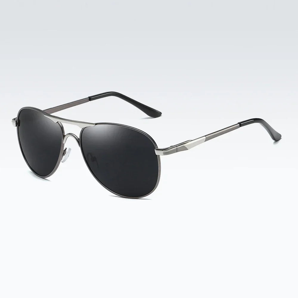 Luxury polarized sunglasses for men and women featuring black silver gray frames, stylish and sun protection by Corporación Turística.