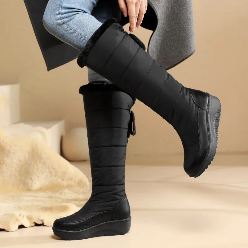 Impermeable winter boots for women by Corporación Turística in white, suitable for snowy and cold weather conditions.