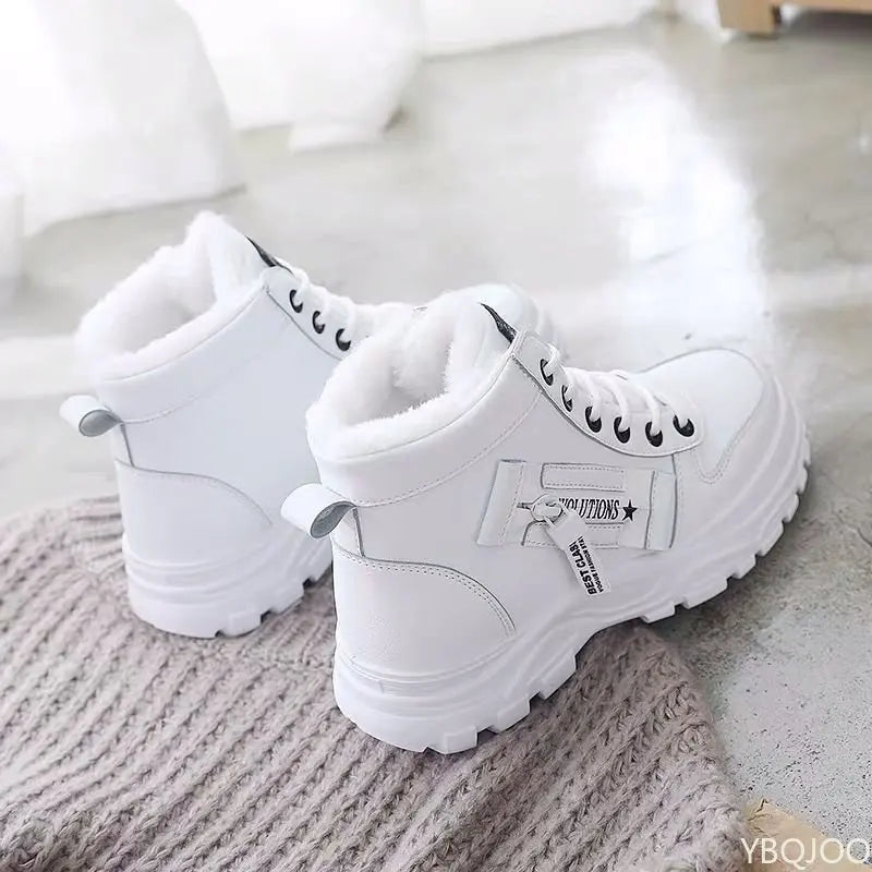 White women's winter shoes by Corporación Turística featuring lace-up design and cozy insulation for cold weather.