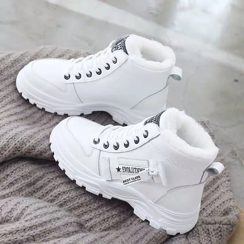Winter women's shoes by Corporación Turística, white lace-up sneakers with cozy insulation and stylish design.