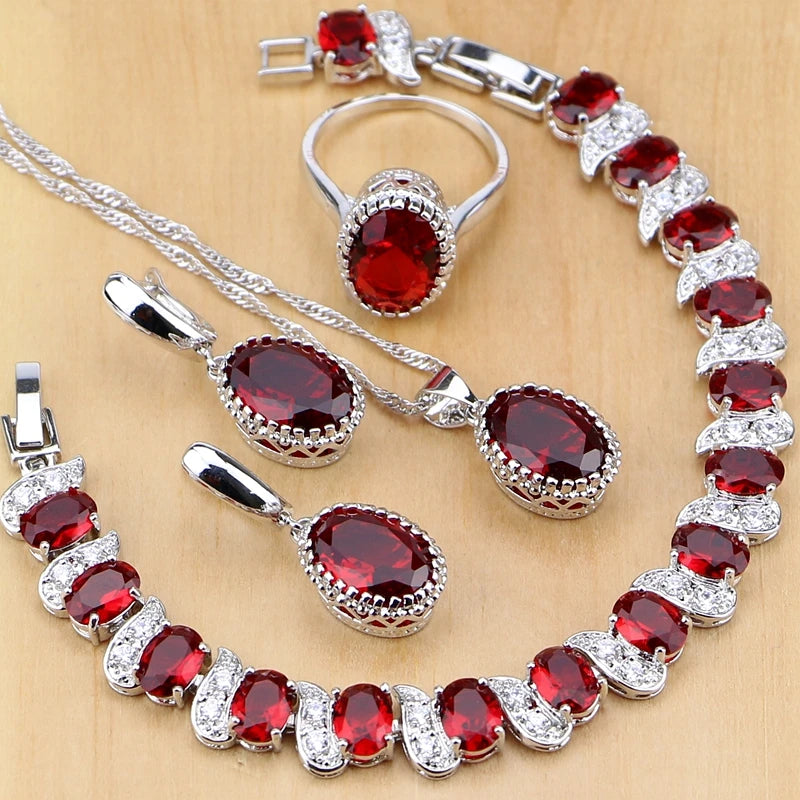 Natural silver 925 jewelry set for women, includes pendant and matching accessories, displayed on a white background.