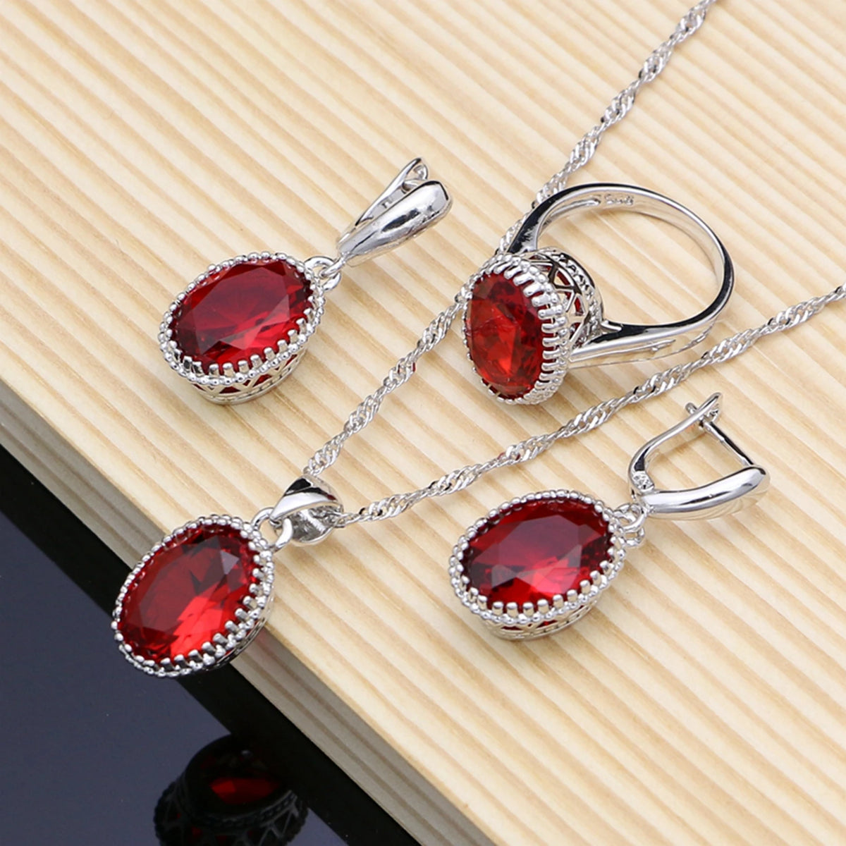 Silver 925 jewelry set for women featuring natural pendant and matching earrings, showcasing elegant, minimalist design.